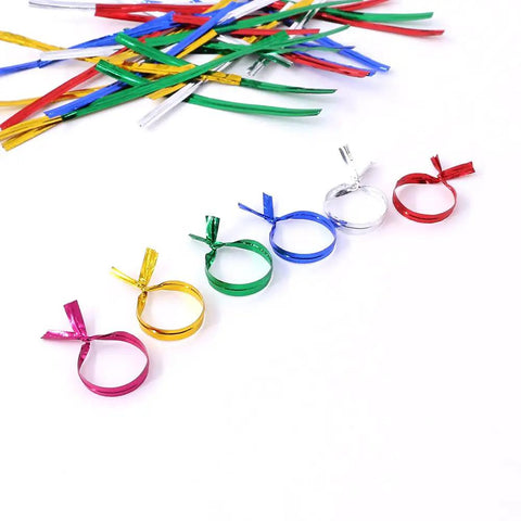 Colorful twist ties including the Silver Metallic Twist Ties For Bread Bags Candy Party Decor 350 Yard Pack Includes Pink Scissors