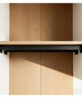 Badass Metal Support Rods For Floating Shelf And Countertop Reinforcement Brackets Heavy Duty Wall Mount Poles installed under wooden shelf.