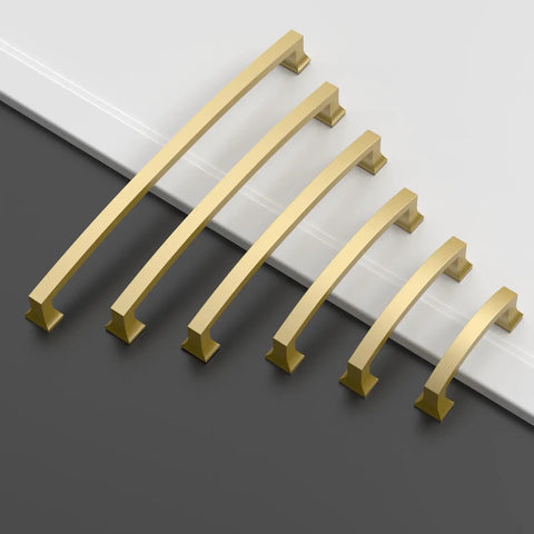Gold cabinet handles on display, various sizes, on black and white background, similar style to 25 Pack 3 Inch Matte Black Cabinet Handles For Cupboards And Drawers, 76mm Hole Centers, Sleek Modern Hardware For Kitchen Cabinets And Dresser Pulls Today