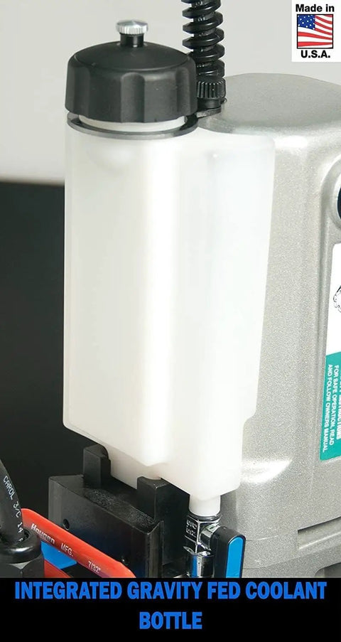 Integrated gravity fed coolant bottle for Heavy Duty 115 Volt Magnetic Drill Built Like A Tank With Kickin Three Speed Gearing Up To Two Three Eighths Inch Capacity.