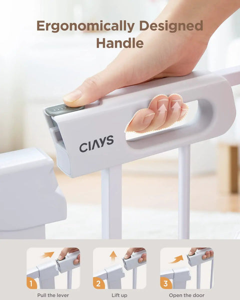 Ergonomically designed handle on adjustable 29.5 to 46 inch wide baby gate for stairs and doorways, auto close feature visible