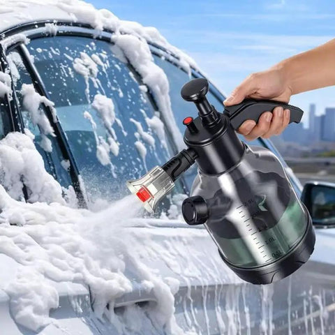 Badass Foam Cannon Pressure Sprayer With Ergonomic Car Wash Soap Dispenser spraying foam on car window, showcasing 2.5L tank.
