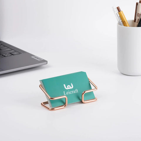 Rose Gold Dope Metal Card Holder For Desk Sleek Card Organizer For Men And Women on office desk near laptop