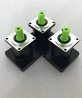 Premium High Speed Planetary Gearbox And Precision Drive Gear Reducer with green output shafts for heavy duty machinery use.