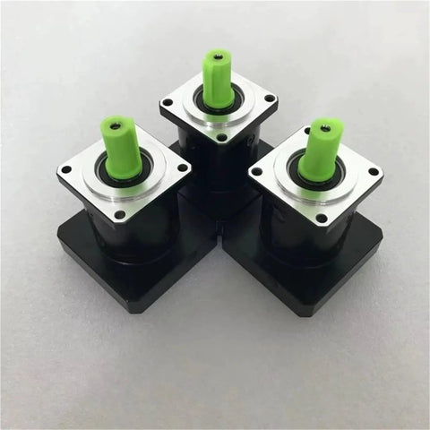 Premium High Speed Planetary Gearbox And Precision Drive Gear Reducer with green output shafts for heavy duty machinery use.