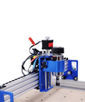 Close-up of Badass 3 Axis CNC Router Station with detailed spindle and motor setup for precision carving on acrylic and MDF.
