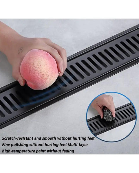 Top Shelf Black Linear Shower Drain Built Tough With 304 Stainless Steel And Slick Hair Catcher Plus No Sweat Tile Installation For Modern Bathroom Remodels, shown with peach in hand.
