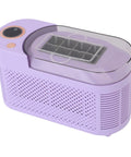 Compact Counter Ice Maker Cranks Out Eight Chill Cubes Quick And Slick Lil Build with see-through lid in lavender color.