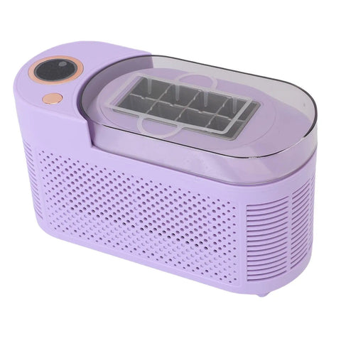 Compact Counter Ice Maker Cranks Out Eight Chill Cubes Quick And Slick Lil Build with see-through lid in lavender color.