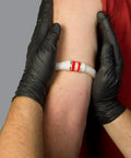 Constricting IV Bands XL With Vacuum Sealed Quick Vein Access For Combat And Trauma, Easy Rolling Action, Built For Big Arms, Beefed Up Medical Gear For Rapid Vein Access In Diabetic Care And Emergencies on forearm