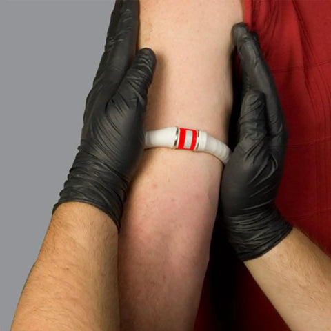 Constricting IV Bands XL With Vacuum Sealed Quick Vein Access For Combat And Trauma, Easy Rolling Action, Built For Big Arms, Beefed Up Medical Gear For Rapid Vein Access In Diabetic Care And Emergencies on forearm