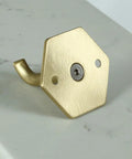 Top Shelf Brass Wall Hooks For Towels And Mugs No Sweat Rust Proof Bathroom Hanger angled view showcasing gold finish and durable design