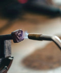 Trigger Start Butane Torch For Welding And Soldering in use with blue flame focused on metal object, TS4000 Style Torch.