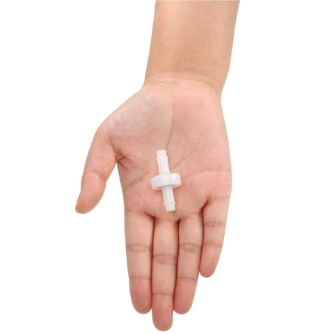 Check valve, white PVDF plastic, 1/4 inch, one-way valve, held in hand.