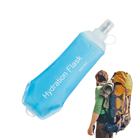 Collapsible Soft Flask Water Bottle With Ergonomic Easy Squeeze For On The Go Hydration next to a hiker with a backpack