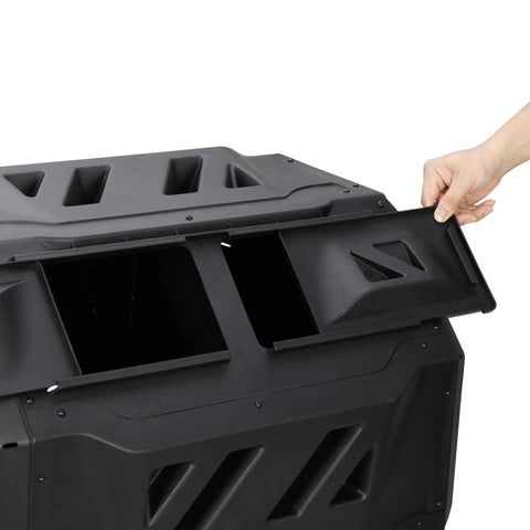 Hand opening sliding door of Outdoor Dual Chamber Tumbling Compost Bin With 43 Gallon Capacity, Rotating Bin Featuring Sliding Doors And Sturdy Steel Frame, BPA Free Outdoor Composting Bin For Garden, Yard, Patio, Or Lawn, Black