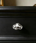 Silver Cloud Shape Cabinet Knob And Drawer Pull Set in polished chrome on black cabinet