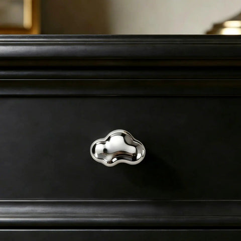 Silver Cloud Shape Cabinet Knob And Drawer Pull Set in polished chrome on black cabinet