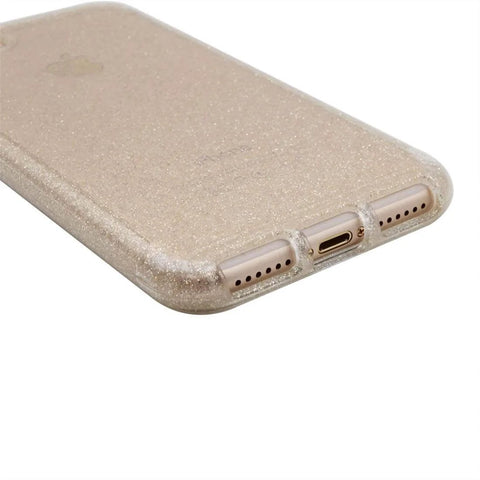Glittery gold smartphone case showing bottom ports and speaker cutouts, enhancing phone protection with style.