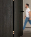 Heavy Duty Hydraulic Buffer Hinge With Invisible Hidden Spring For Automatic Soft Close Silent Operation Built Tough Without The Hassle For Every Interior Or Exterior Door Install on dark wooden door.