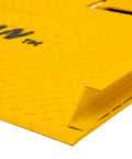 Built Tough Steel Dock Board 60 X 72 Inch 16000 Lb Rated Capacity Forklift Transfer Plate edge detail with raised surface.