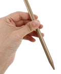 Close-up of hand holding a stake from the 6 Piece Adjustable Tent Pole Kit With Heavy Duty Metal Stakes And Tent Hooks