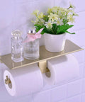 Dual Roll Toilet Paper Holder With Phone Shelf In 304 Stainless Steel Rust Proof Brushed Gold Finish Dope Modern Luxury Look Two Roll Capacity And Handy Phone Storage Wall Mounted Bathroom Dispenser Easy Install with decorative items on top shelf