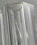 Close-up of geometric cylindrical glass shade of Super Sleek Modern Copper Brass Wall Sconce For Bedroom Bedside And Living Room E14 Compatible Accent Lamp.