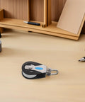 Beefy Stainless Steel Sailing Pulley With Nylon Bearing Wheel on a desk, Single Swivel Block for sailboats and marine gear.