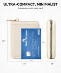 RFID Leather Credit Card Holder For Women, compact zipper wallet with 9 card slots shown with blue credit card for size comparison