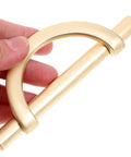 Close-up of a Six Piece Zinc Alloy Half Round Cabinet Pull with Gold Brushed Finish, showing design and smooth texture.
