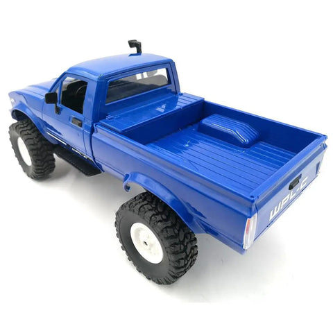 RC Rock Crawler WPL C24 RTR 1/16 Scale Pickup Truck with LED Lights, blue body, high traction tires, rear view