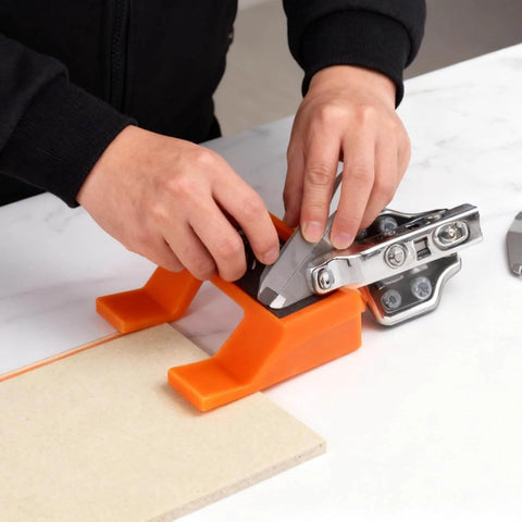 Magnetic Cabinet Door Hinge Spacer With Scale For A Clean 2mm Gap Handy Hinge Alignment Tool For Cabinet Door Installations Magnetic Hinge Jig To Nail The Door Gap 2 Pack In Bright Orange being used to align a cabinet door hinge.