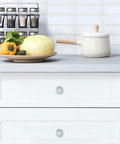 Slick Teal Agate Crystal Glass Cabinet Pulls 4 Pack For Dressers Kitchen Cabinets And Vanities Solid Mushroom Design Cupboard Handles With Screws Zero Fuss 35Mm Fit on white drawers with vegetables and kettle.
