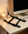 Built Tough Under Desk PC Mount With Quick Lock Straps For Heavy Duty Computer Tower Rack displayed on a desk with accessories.