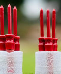 Close-up of six red Bold Bang Golf Tees Sneaky Prank That Sparks Hilarious Reactions On The Green While Looking Like A Real Tee Safe Easy