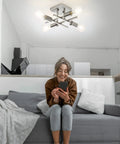 4 Light Semi Flush Mount Ceiling Light Fixture In Brushed Nickel Modern Farmhouse Sputnik Style above woman on sofa