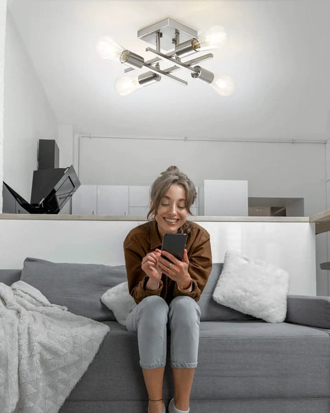 4 Light Semi Flush Mount Ceiling Light Fixture In Brushed Nickel Modern Farmhouse Sputnik Style above woman on sofa
