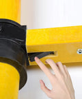Close-up of Beefed Up Non Conductive Fiberglass Telescoping Ladder For Electrical Work showing pivot mechanism and hand adjustment.