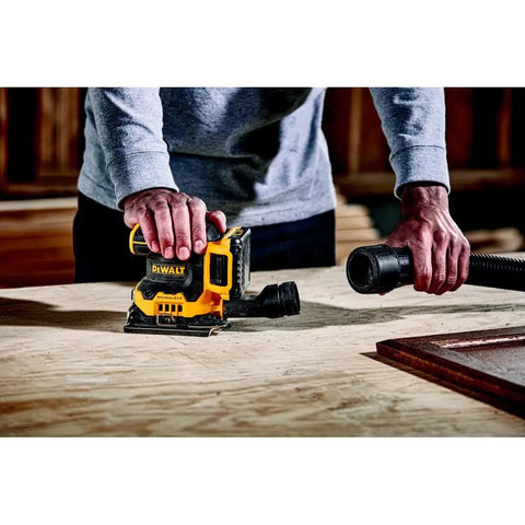 Person using Cordless Quarter Sheet Sander Kit With Brushless Motor Variable Speed 8000 To 14000 OPM 20V Max XR 2.0Ah Battery