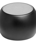 Top view of a round black Bluetooth speaker, complementing Thunderbolt USB C Docking Station With 130W Power Delivery Handles Quad 4K Displays.