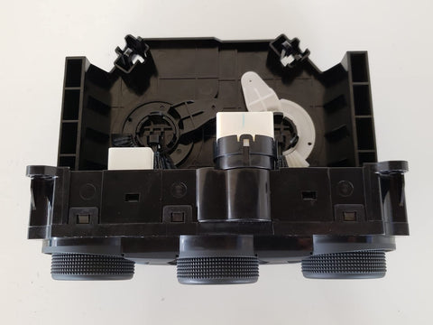 Rear view of Subaru Heater Control Assembly For HVAC System With 4 Position Push Button Switch And Rotary Actuator Manual Operation