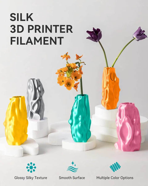 Silk PLA Filament 1.75mm 1kg for 3D printers with a dope glossy silk finish, shown in multiple colors with a smooth surface ideal for art.