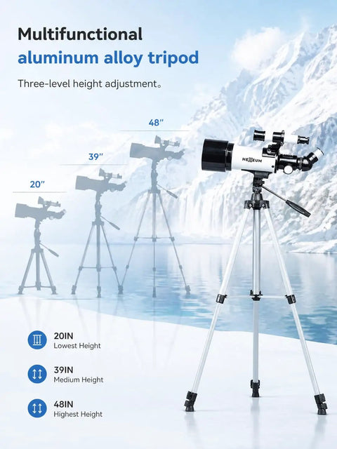 Kid Friendly Portable Refractor Telescope For Kids And Adults With 70mm Aperture on adjustable aluminum tripod with snowy backdrop