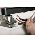 Powerful One Horsepower Oscillating Spindle Sander Featuring Rock Solid Cast Iron Table And Roomy Four Inch Dust Port adjustment dial close-up.