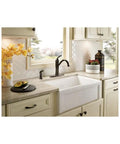 Braemore Mediterranean Bronze High Arc Kitchen Faucet With Side Spray Duralock Quick Connect One Handle Lever Easy Install Rich Dark Brown Finish For Classic Kitchen Cleaning And Modern Style with a view of kitchen sink area.