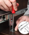 Installing Rock Solid 14 Inch Keyboard Drawer Slides With Smooth Ball Bearings under a desk with tools for workspace use.