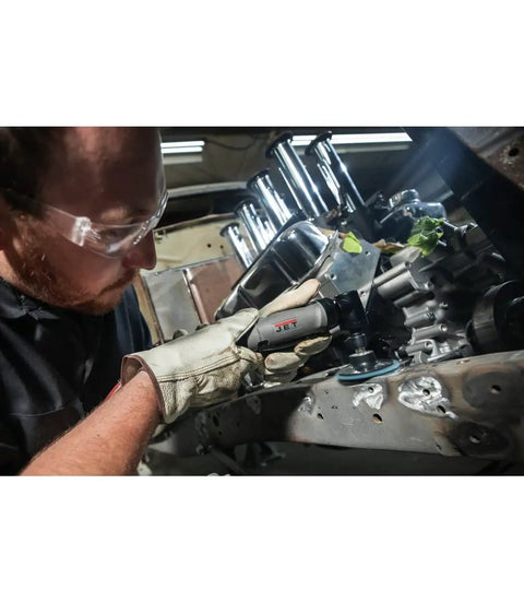 Mechanic using One Quarter Inch Right Angle Die Grinder With Composite Housing Twenty Thousand RPM One Third HP Lightweight under car hood