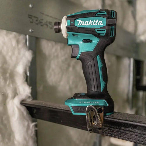 Brushless 18V Cordless Impact Driver With Quick Shift Mode and 4 Speed Settings, shown on a construction site rail