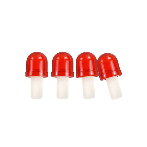 Four red and white plastic caps on a white background shown from the top angle.